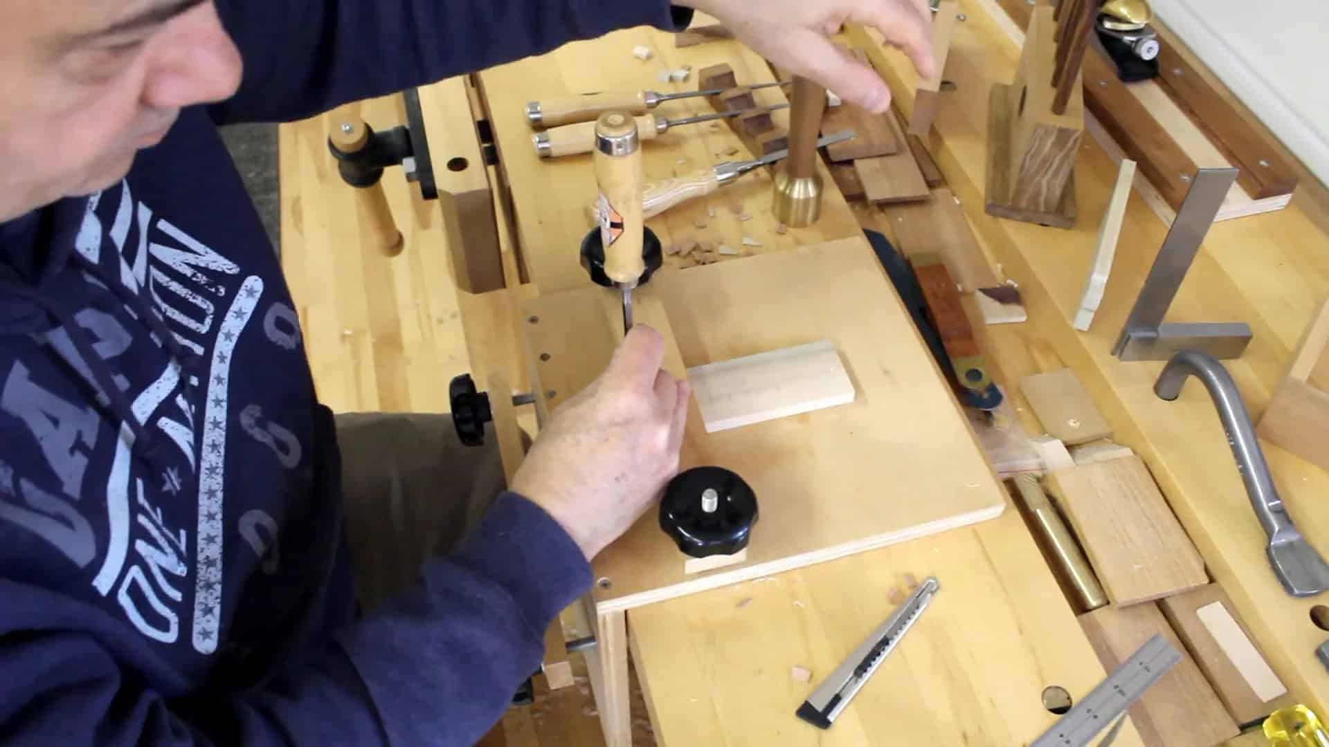 Using a chisel to clean out the center portion