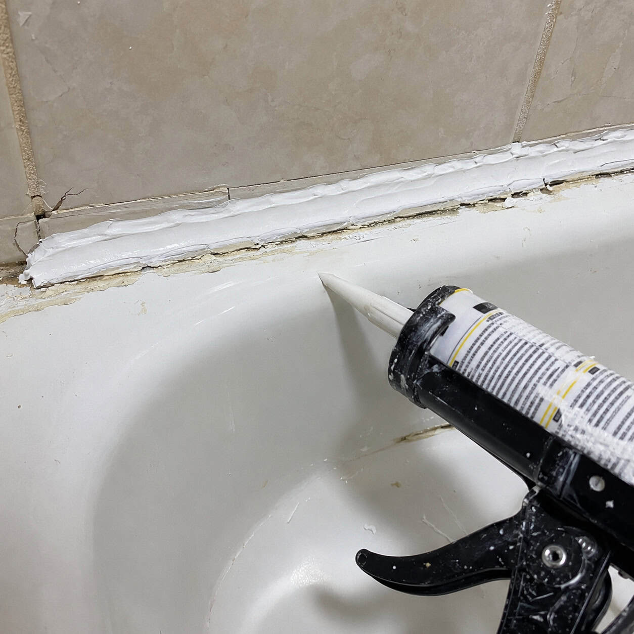 Caulk Over Caulk Around Tubs and Showers