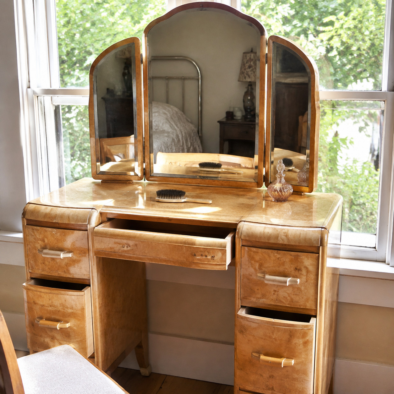The Vanity With the Tri-Fold Mirror
