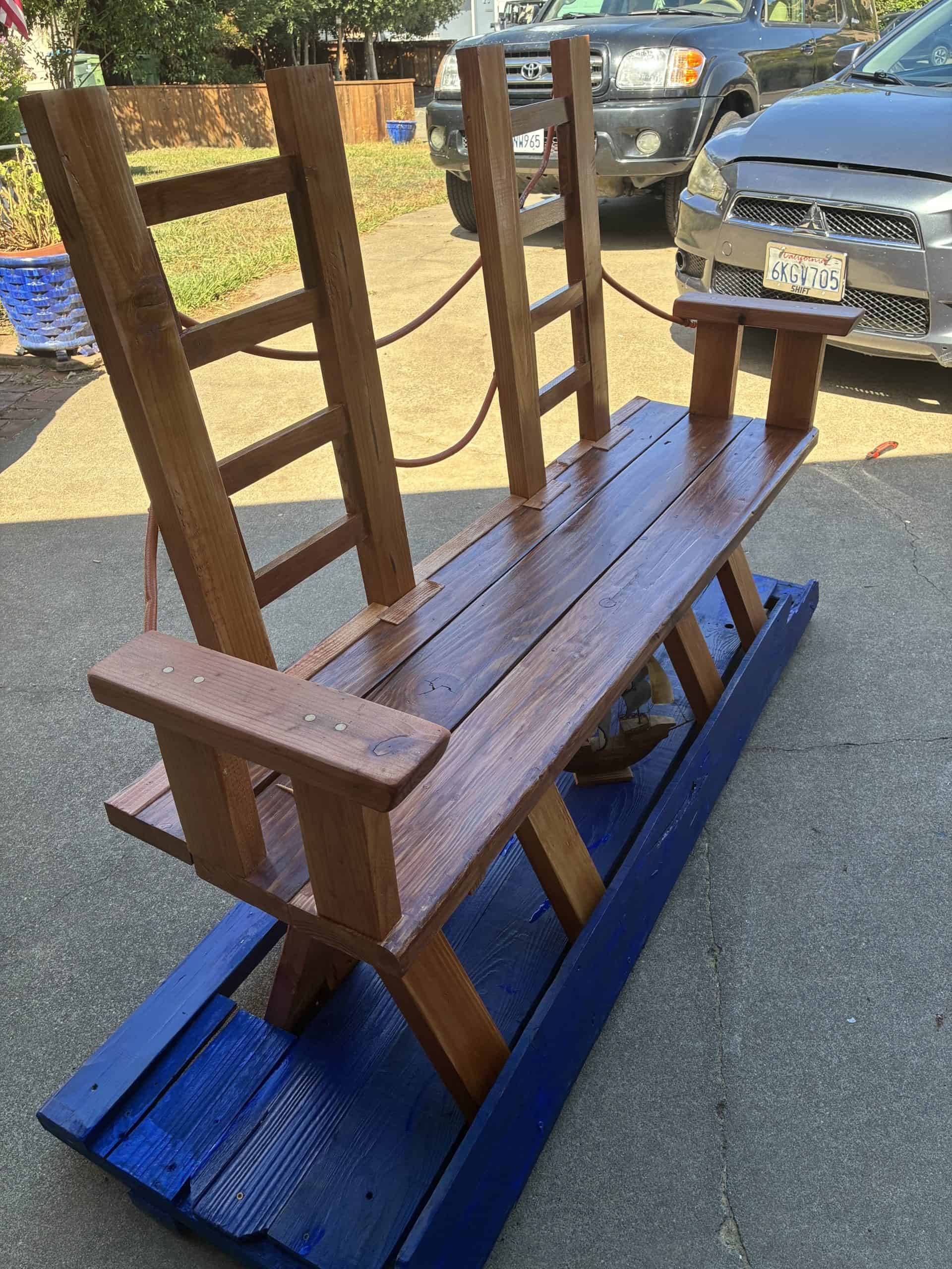 Side view showing the armrests and the tower uprights.