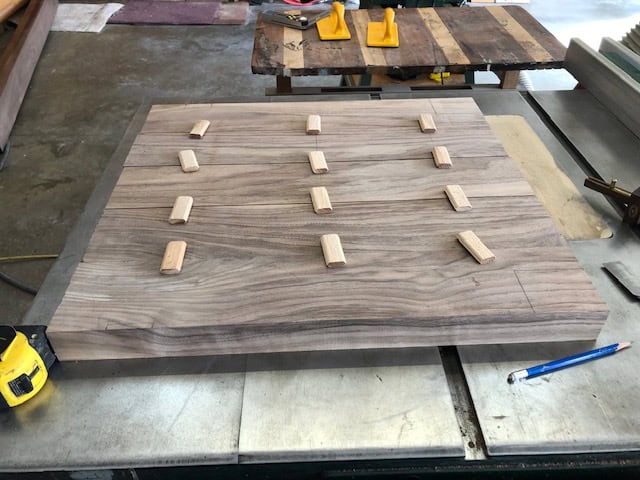 The seat starts as a glued-up walnut blank.