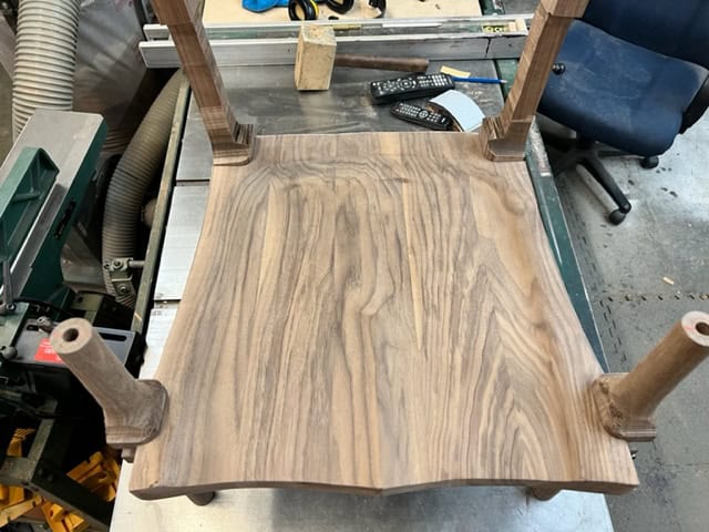 Seat and rear legs joined, showing the signature Maloof joint.