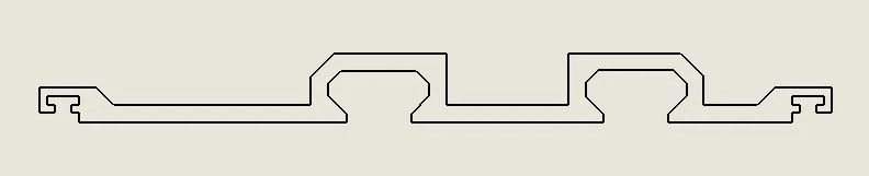 Cross-section profile of the TrueTrac guide rail showing the opposing bevels and center keyway