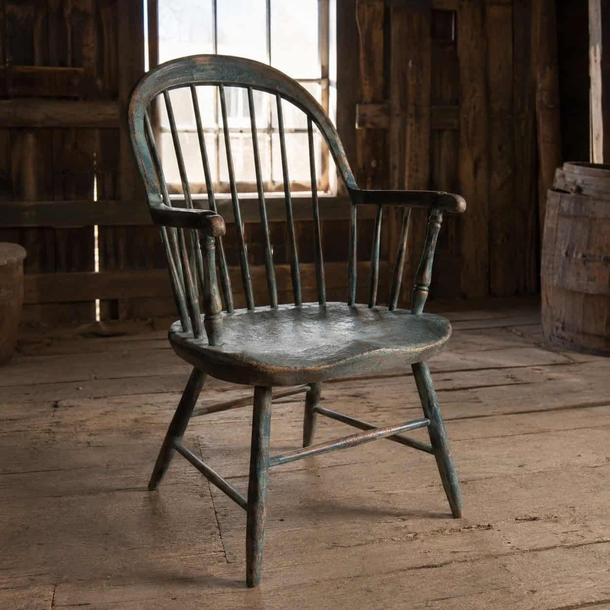 A Windsor Chair With a Carved Saddle Seat