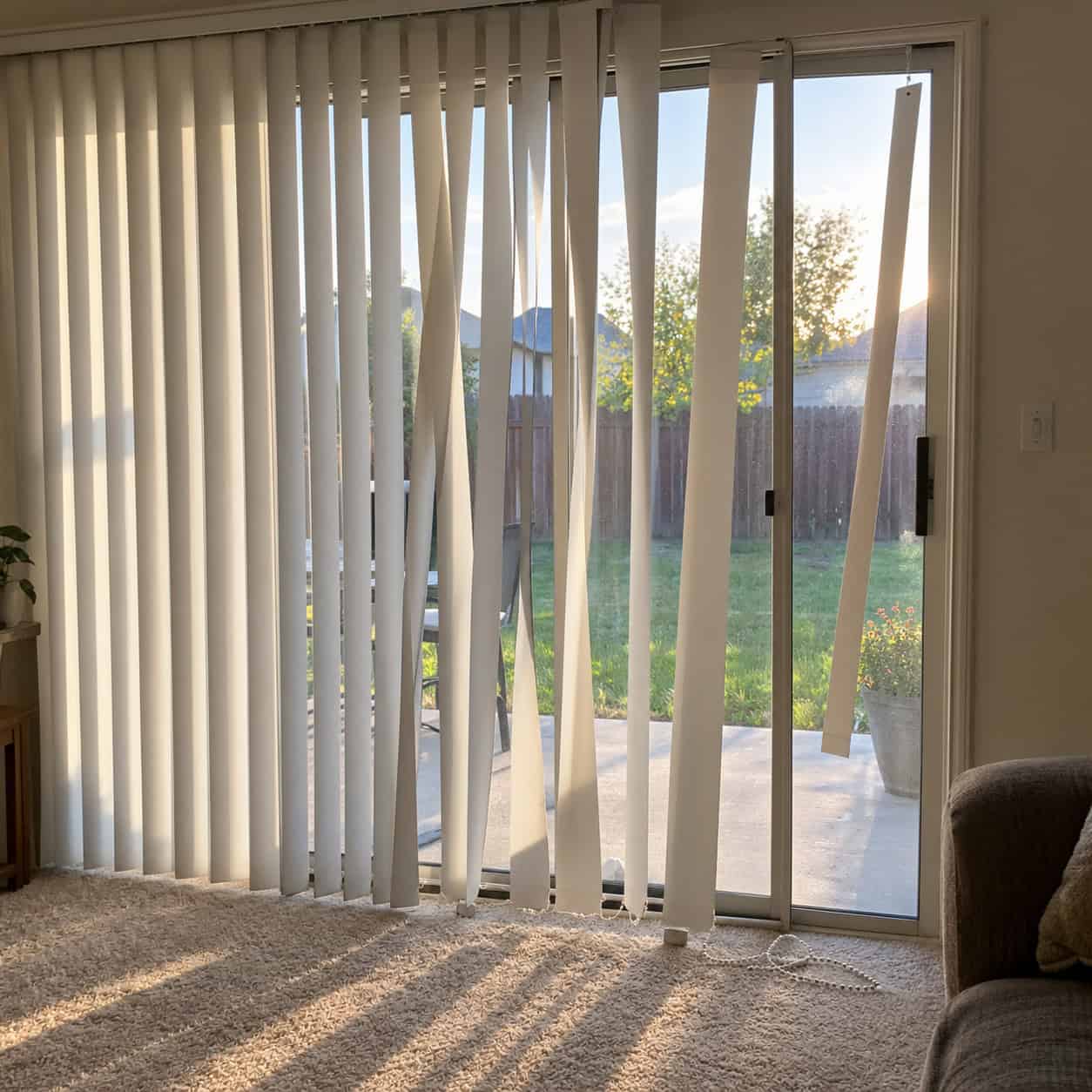 Vertical Blinds Clattering Across the Patio Door