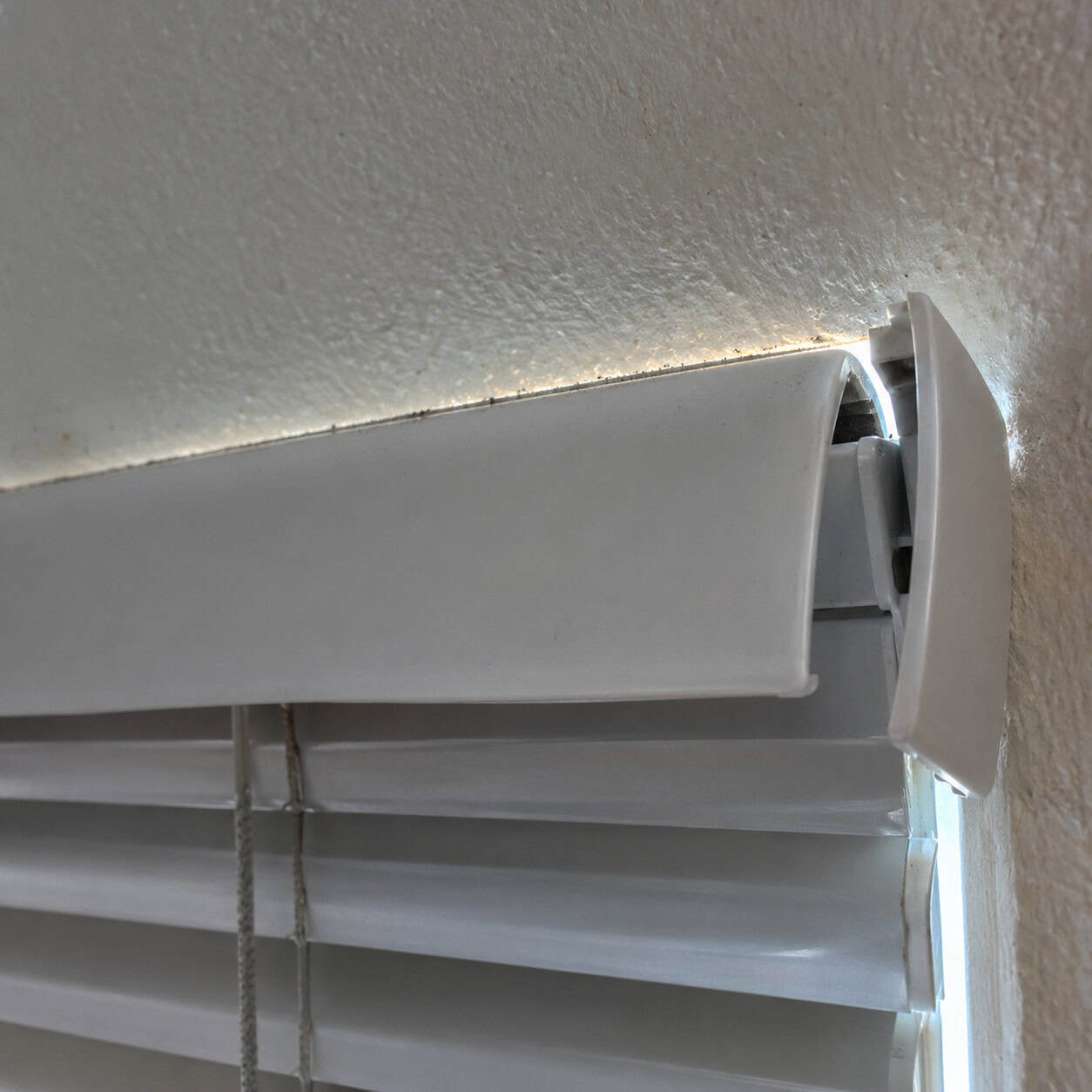 The Clip-On Plastic Valance Across the Blind Headrail