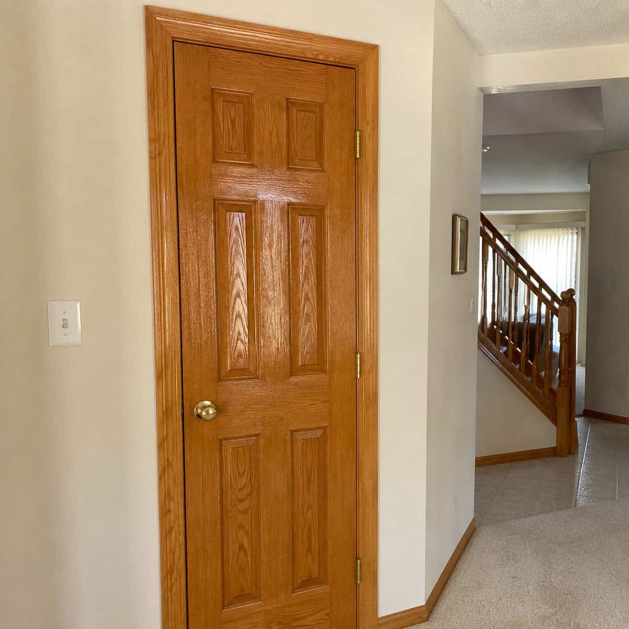 Honey Oak Trim and Oak Six-Panel Doors