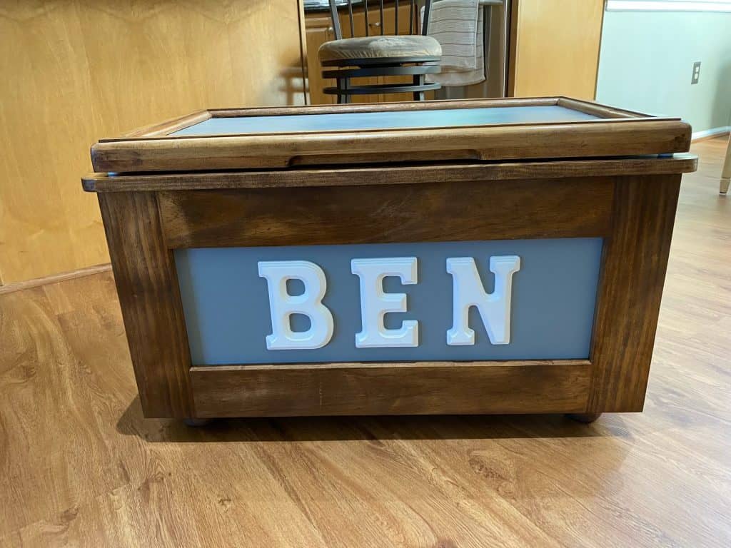 The second stained box, "BEN," with a blue panel and a milled trim frame around the lid.