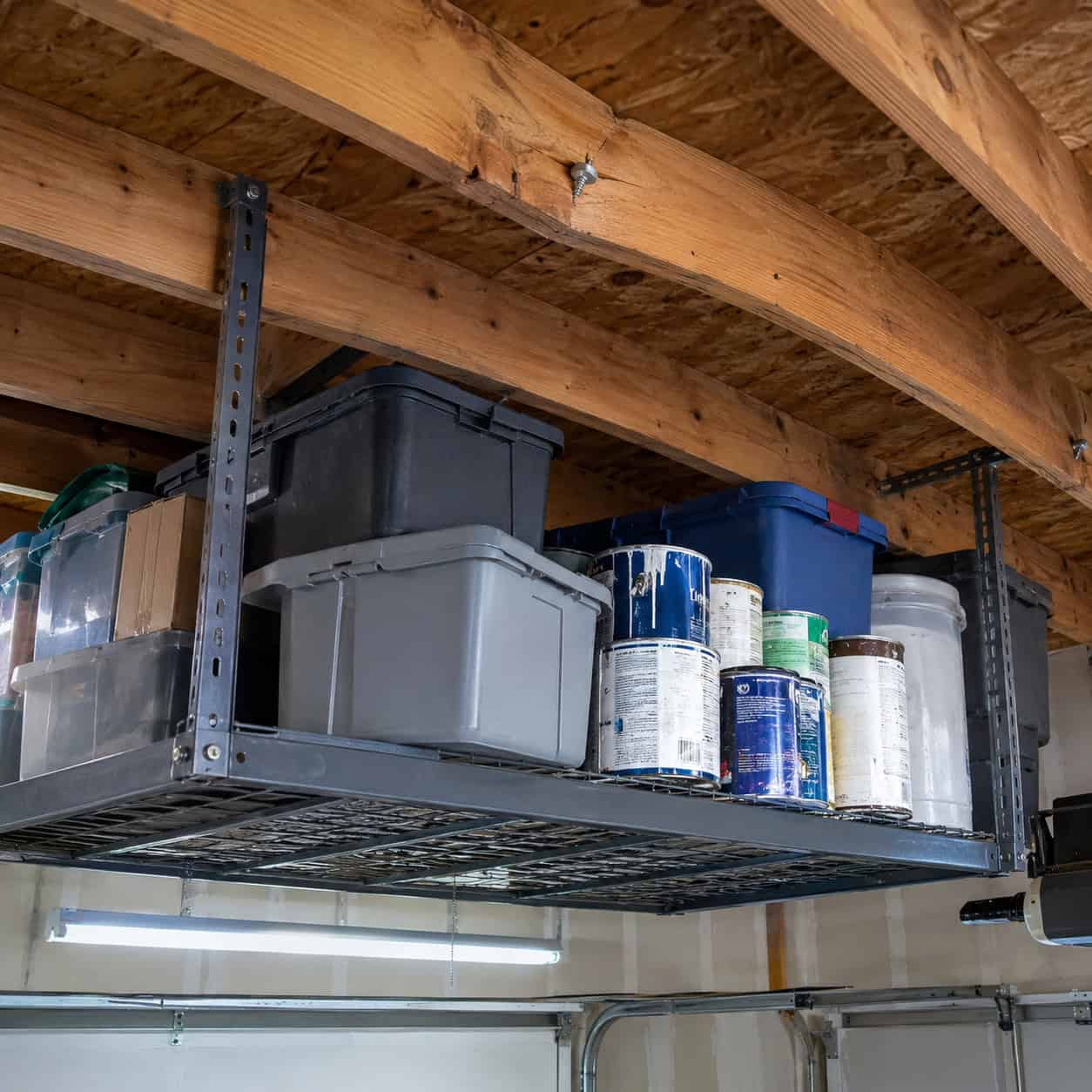 Overhead ceiling racks loaded like a warehouse