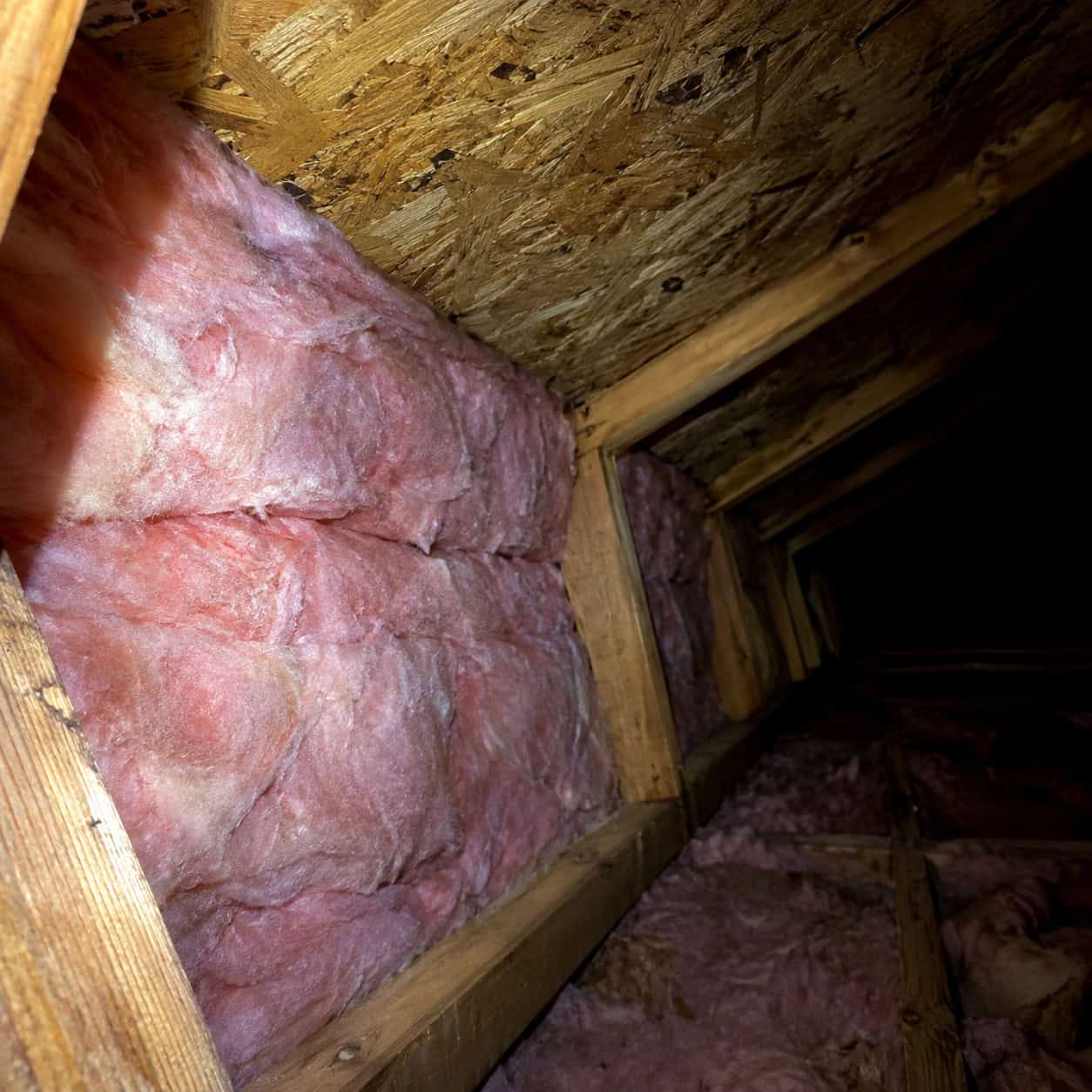 Insulation Jammed Into the Eaves With No Baffles