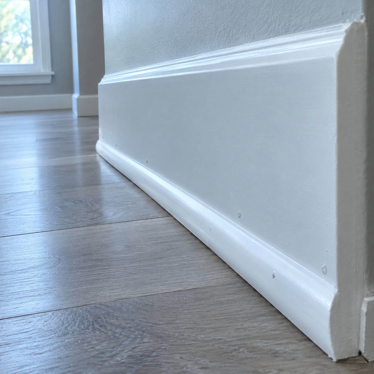 Quarter Round Tacked Over Brand-New Baseboard