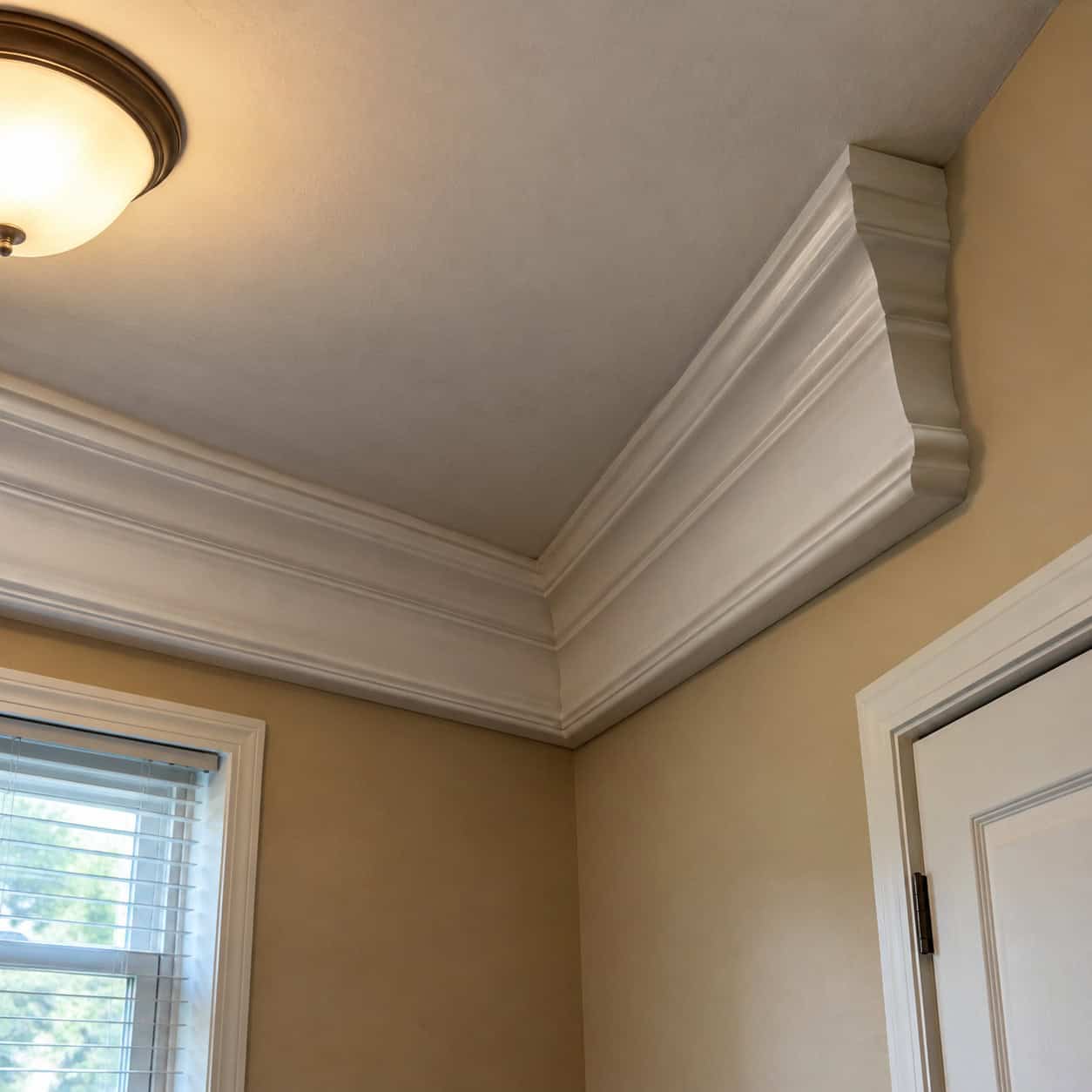 Crown Molding Squeezed Onto an 8-Foot Ceiling