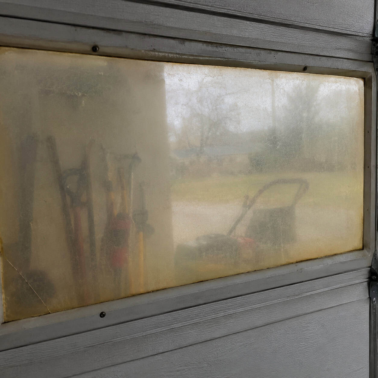 Snap-in acrylic window inserts for the garage door