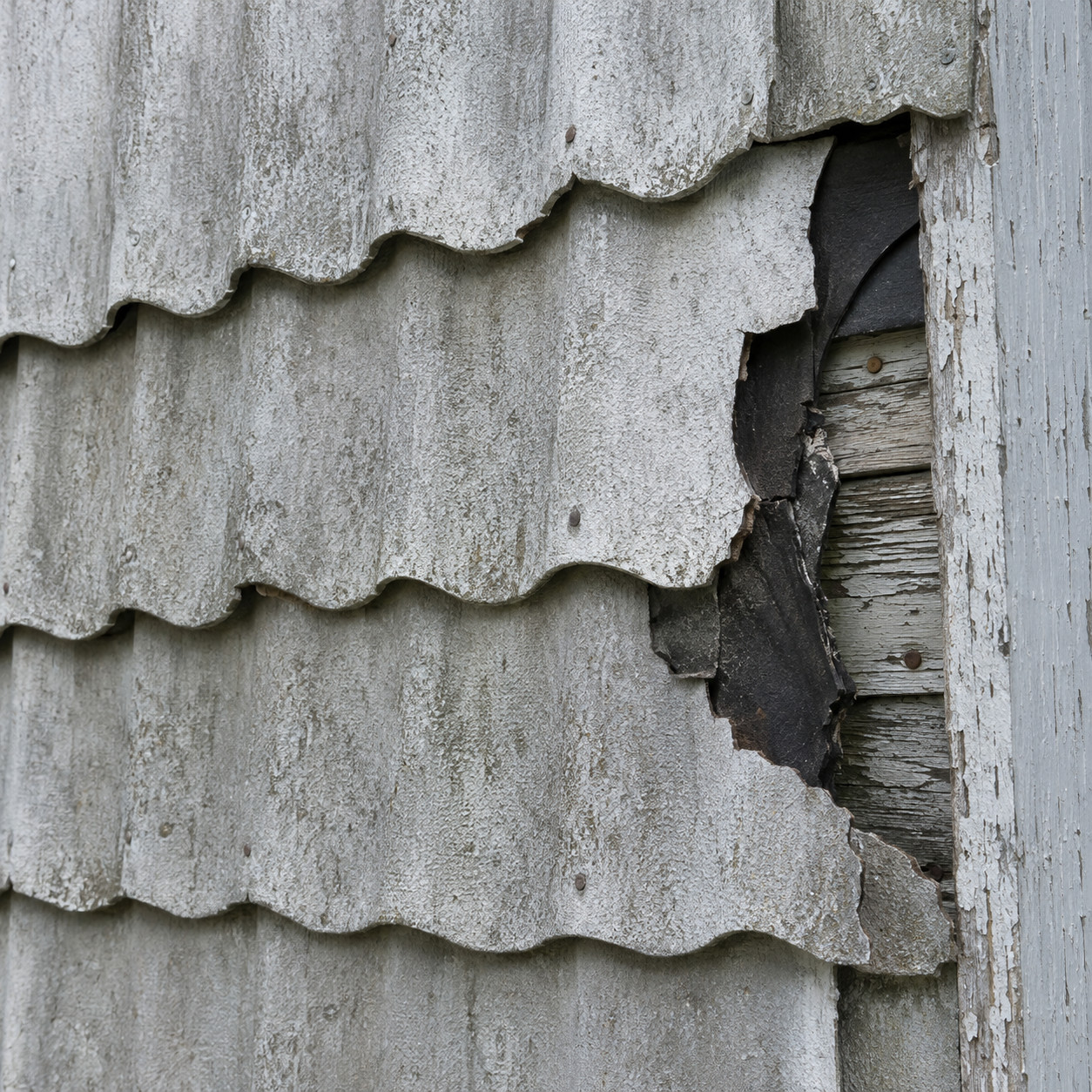 Asbestos-Cement Shingles Ripped Off Over a Weekend