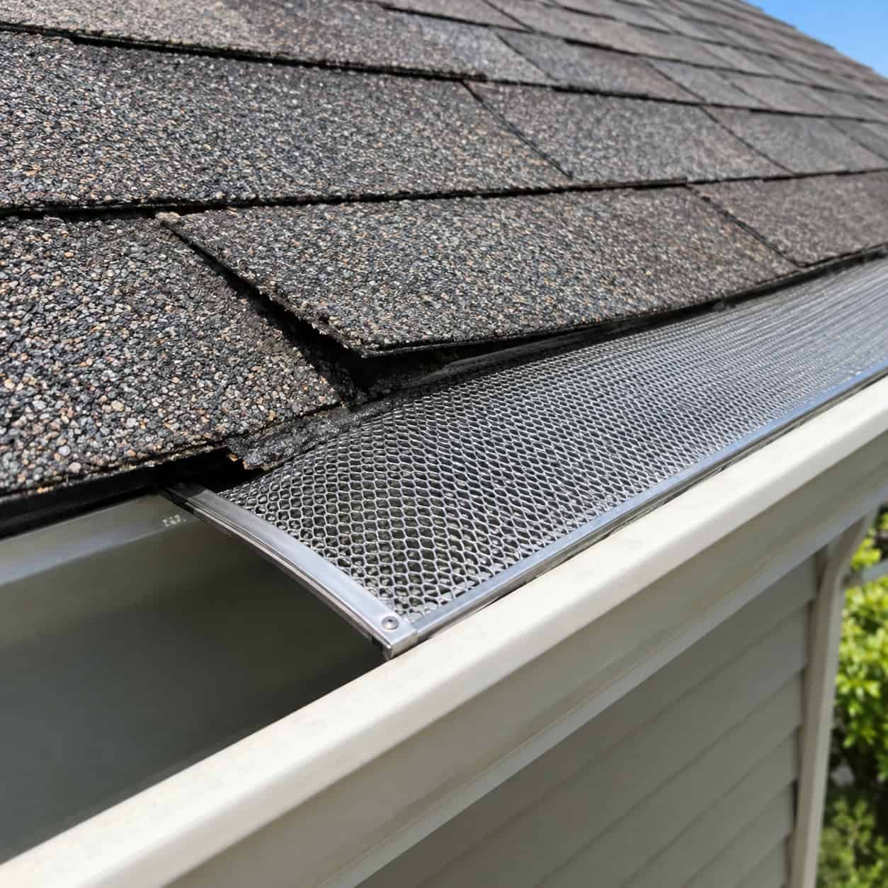 Gutter Guards Slipped Under the Shingle Course