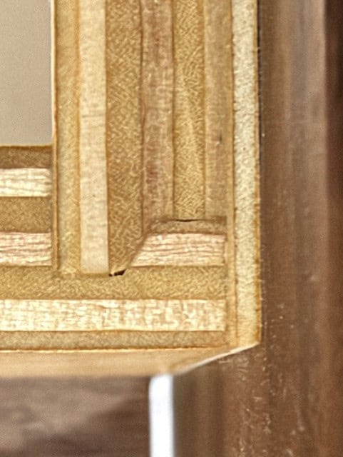 Close-up of a drawer corner cut with a Freud drawer lock bit.