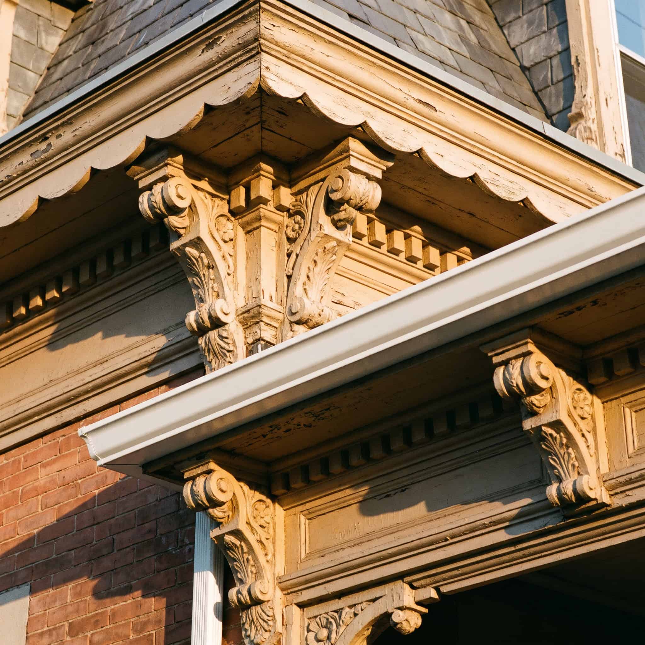 Stamped White K-Style Gutters on a Victorian