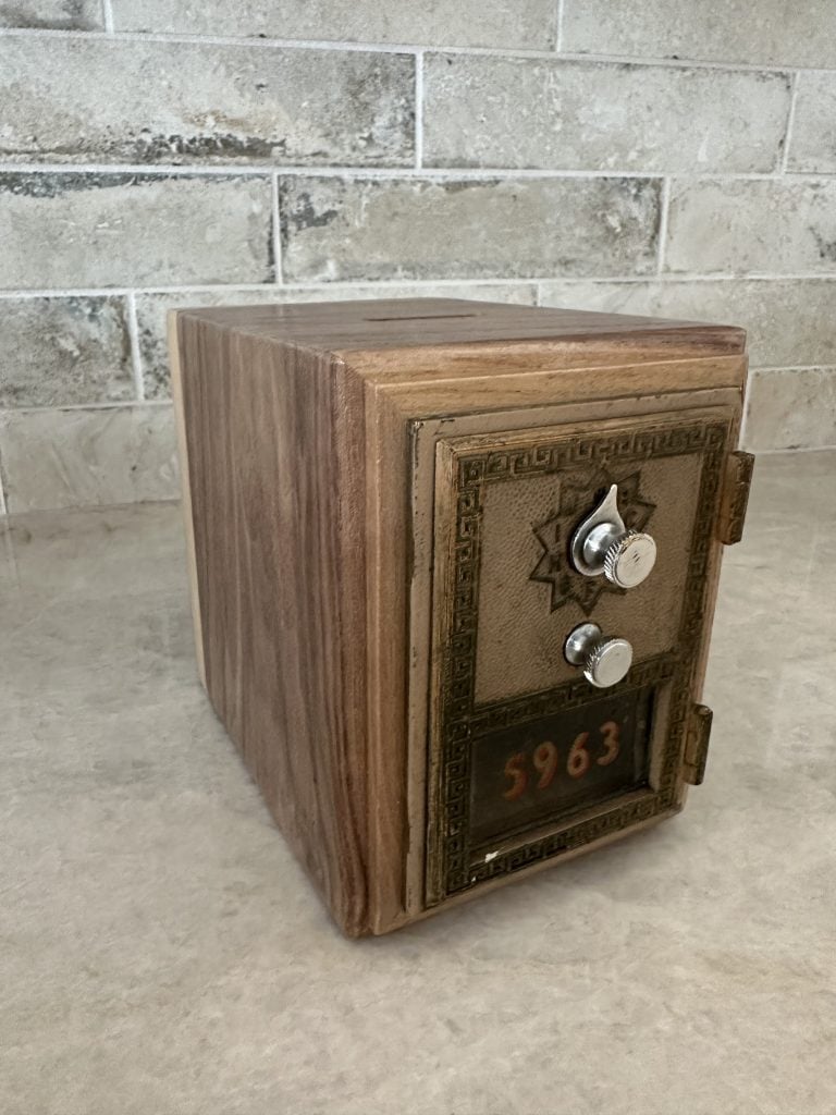 The second bank, number 5963, with a combination dial and the coin slot visible on top.